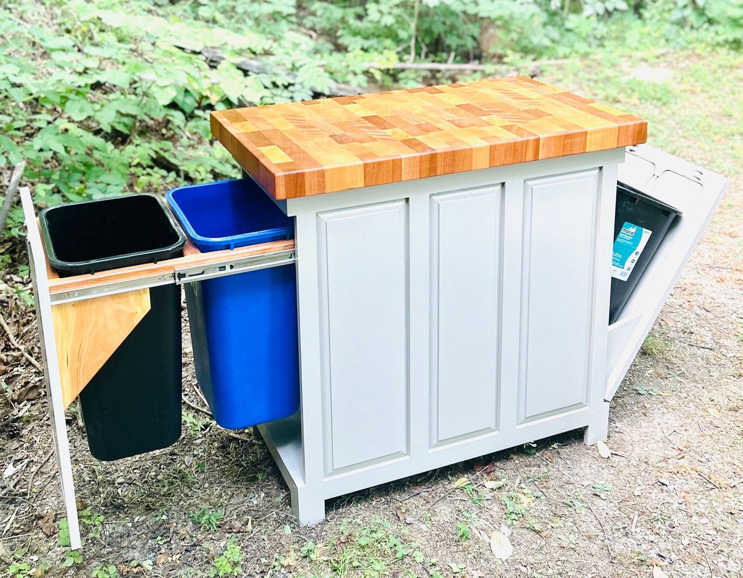 Triple Trash and Recycle kitchen island with end grain butcher block top, slide out trash and recycle, tilt out trash bin