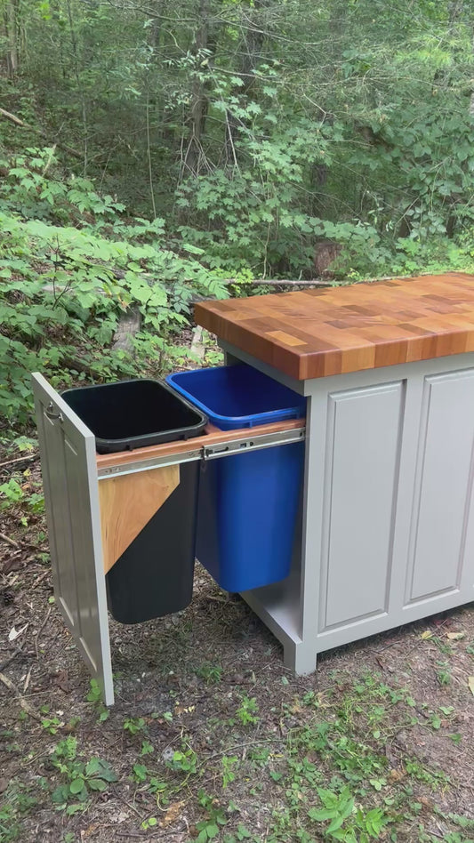Triple Trash and Recycle kitchen island with end grain butcher block top, slide out trash and recycle, tilt out trash bin